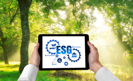 Green business transformation for environment saving and ESG business concept. Businessman using...