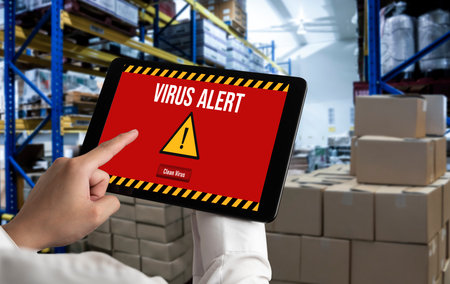 Virus warning alert on computer screen detected modish cyber threat , hacker, computer virus and...