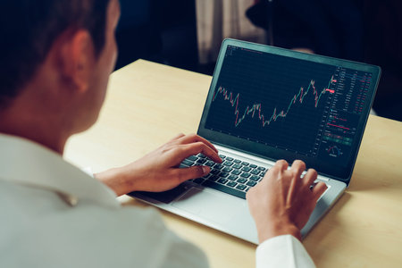 Stock market data chart analysis by ingenious computer software . Investment application display...