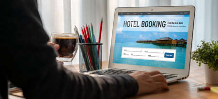 Online hotel accommodation booking website provide modish reservation system . Travel technology concept .の写真素材