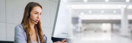 Business people wearing headset working in office in widen view to support remote customer or...