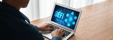 Decentralized finance or DeFi concept on modish computer screen . The defi system give new choice of investment and money saving .の写真素材