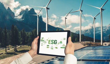 Green business transformation for environment saving and ESG business concept. Businessman using...
