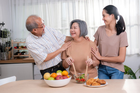 Contented family, daughter, father, mother prepare bread veggies and fruit salad together in their...