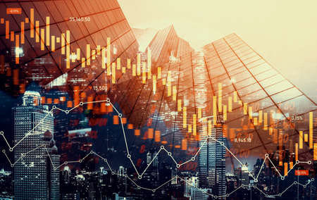 Economic crisis concept shown by declining graphs and digital indicators overlap modernistic city background. Double exposure.の写真素材