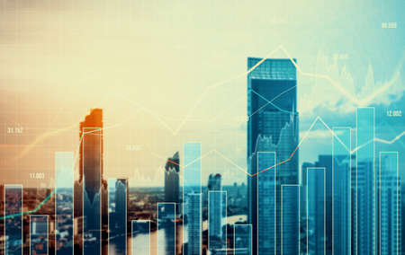 Stock market business concept. Financial graphs and digital indicators with modernistic urban area and skyscrapers as background. Double Exposure.の写真素材