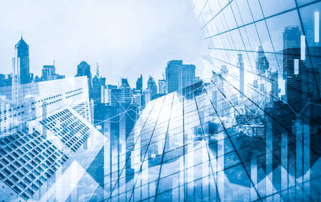 Stock market business concept. Financial graphs and digital indicators with modernistic urban area and skyscrapers as background. Double Exposure.の写真素材