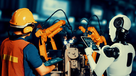 Cybernated industry robot and human worker working together in future factory . Concept of...