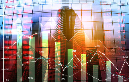 The digital indicators and declining graphs of a stock market crash overlap the backdrop of a modernistic city. Concept of a market crash in double exposure.の写真素材