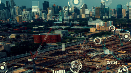 Construction technology concept with alteration graphic over construction site showing concept of automation and remote wireless machine control by using futuristic HUD in a computer software .の写真素材