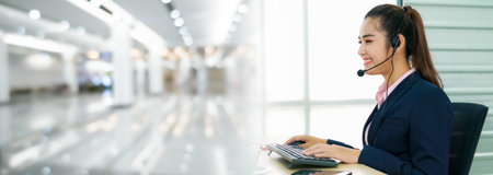 Business people wearing headset working in office in widen view to support remote customer or...