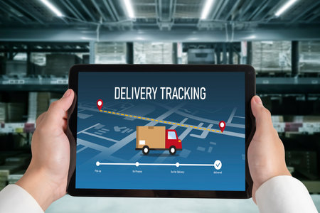 Delivery tracking system for e-commerce and modish online business to timely goods transportation and deliveryの写真素材