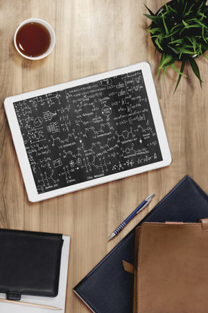 Mathematics equations and modish formula on computer screen showing concept of science and education