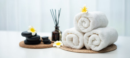 Spa accessory composition set in day spa hotel , beauty wellness center . Spa product are placed in...