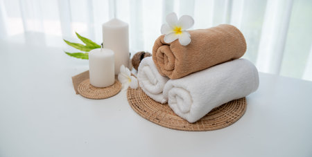 Spa accessory composition set in day spa hotel , beauty wellness center . Spa product are placed in...