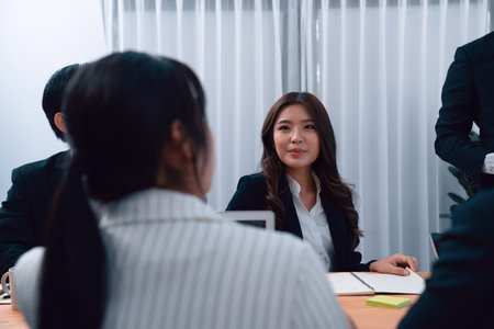 Business team of financial data analysis meeting with business intelligence, report paper and...