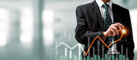 Businessman analyst working with digital finance business data graph showing technology of...