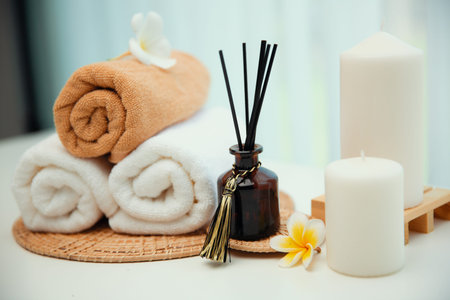 Spa accessory composition set in day spa hotel , beauty wellness center . Spa product are placed in...