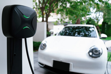 Focus electric home charging station powered from green energy at home for vehicle engine....