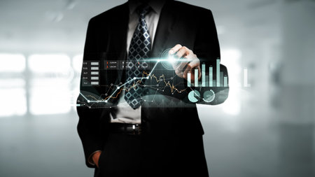 Businessman analyst working with digital finance business data graph showing technology of investment strategy for perceptive financial business decision. Digital economic analysis technology concept.の写真素材