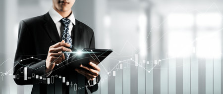 Businessman analyst working with digital finance business data graph showing technology of...