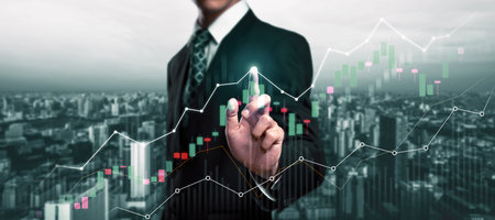 Businessman analyst working with digital finance business data graph showing technology of...