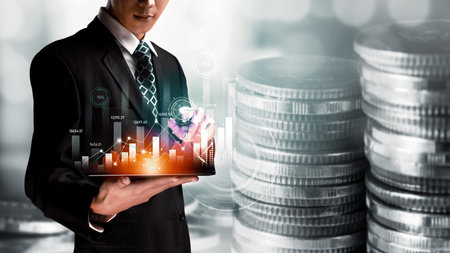 Businessman analyst working with digital finance business data graph showing technology of investment strategy for perceptive financial business decision. Digital economic analysis technology concept.の写真素材