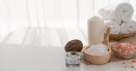 Spa accessory composition set in day spa hotel , beauty wellness center . Spa product are placed in...