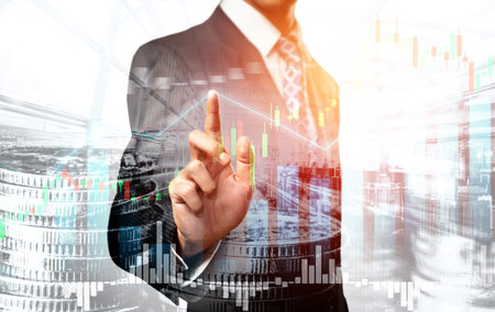 Businessman analyst working with digital finance business data graph showing technology of investment strategy for perceptive financial business decision. Digital economic analysis technology concept.の写真素材