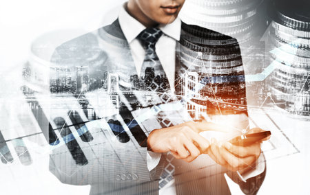 Businessman analyst working with digital finance business data graph showing technology of investment strategy for perceptive financial business decision. Digital economic analysis technology concept.の写真素材