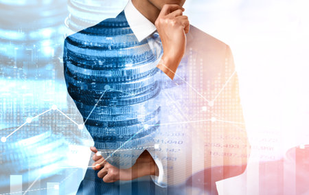 Businessman analyst working with digital finance business data graph showing technology of investment strategy for perceptive financial business decision. Digital economic analysis technology concept.の写真素材