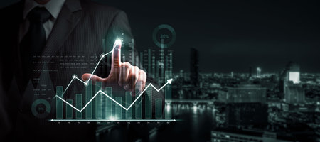 Businessman analyst working with digital finance business data graph showing technology of...