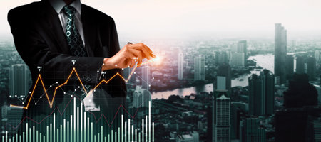 Businessman analyst working with digital finance business data graph showing technology of investment strategy for perceptive financial business decision. Digital economic analysis technology concept.の写真素材