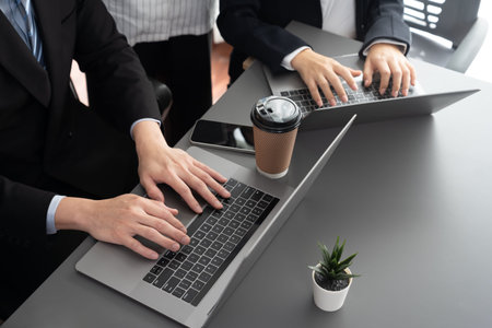 Business team analyze business analytic or business intelligence dashboard on laptop screen show...