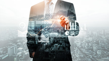 Businessman analyst working with digital finance business data graph showing technology of investment strategy for perceptive financial business decision. Digital economic analysis technology concept.の写真素材