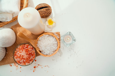 Spa accessory composition set in day spa hotel , beauty wellness center . Spa product are placed in luxury spa resort room , ready for massage therapy from professional service .の写真素材