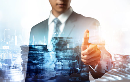 Businessman analyst working with digital finance business data graph showing technology of investment strategy for perceptive financial business decision. Digital economic analysis technology concept.の写真素材