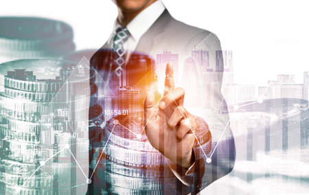 Businessman analyst working with digital finance business data graph showing technology of investment strategy for perceptive financial business decision. Digital economic analysis technology concept.の写真素材