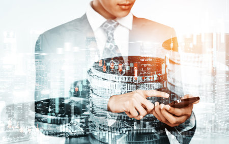 Businessman analyst working with digital finance business data graph showing technology of investment strategy for perceptive financial business decision. Digital economic analysis technology concept.の写真素材