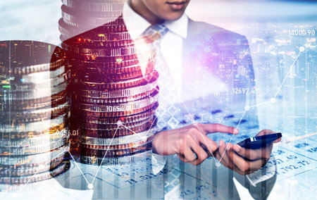 Businessman analyst working with digital finance business data graph showing technology of investment strategy for perceptive financial business decision. Digital economic analysis technology concept.の写真素材