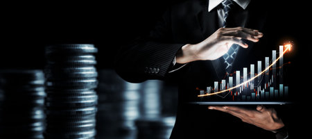 Businessman analyst working with digital finance business data graph showing technology of investment strategy for perceptive financial business decision. Digital economic analysis technology concept.の写真素材