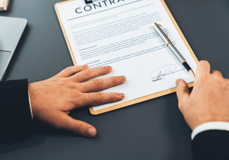 Closeup hand signing contract document with pen, sealing business deal with signature....