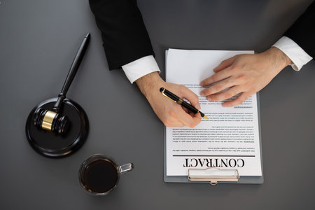 Top view lawyer signing contract, professional lawyer in law firm office drafting legal document or contract agreement ensuring lawful protection for clients dispute concept. Equilibriumの写真素材