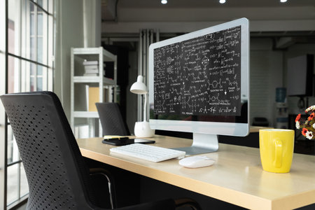 Mathematic equations and modish formula on computer screen showing concept of science and educationの写真素材