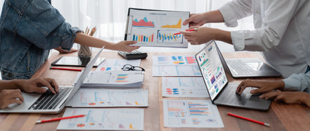 Panorama shot analyst team utilizing BI Fintech to analyze financial report with laptop....