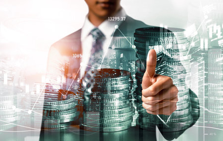 Businessman analyst working with digital finance business data graph showing technology of investment strategy for perceptive financial business decision. Digital economic analysis technology concept.の写真素材
