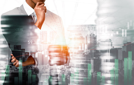 Businessman analyst working with digital finance business data graph showing technology of investment strategy for perceptive financial business decision. Digital economic analysis technology concept.の写真素材