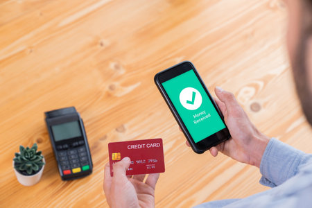 Fast and secure transactions using QR code technology on mobile banking app, enabling seamless...
