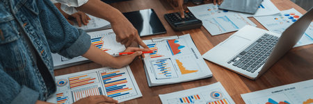 Analyst team utilizing BI Fintech to analyze and pointing at financial dashboard paper office....