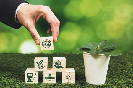 Businessman holding plant pot with ECO cube symbol. Forest regeneration and natural awareness. Ethical green business with eco-friendly policy utilizing renewable energy to preserve ecology. Alterの写真素材